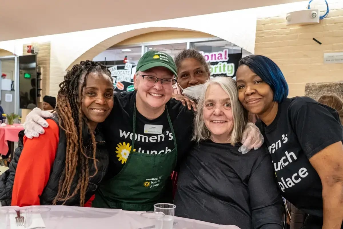 Women gathered at Woman’s Lunch Place, representing programs for girls and women supported by Jewish grants in Boston through The Miriam Fund.