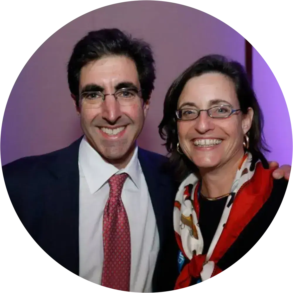 A man and woman talking together during a CJP Acharai Leadership Program event, illustrating fellows building connections in Greater Boston’s Jewish community.