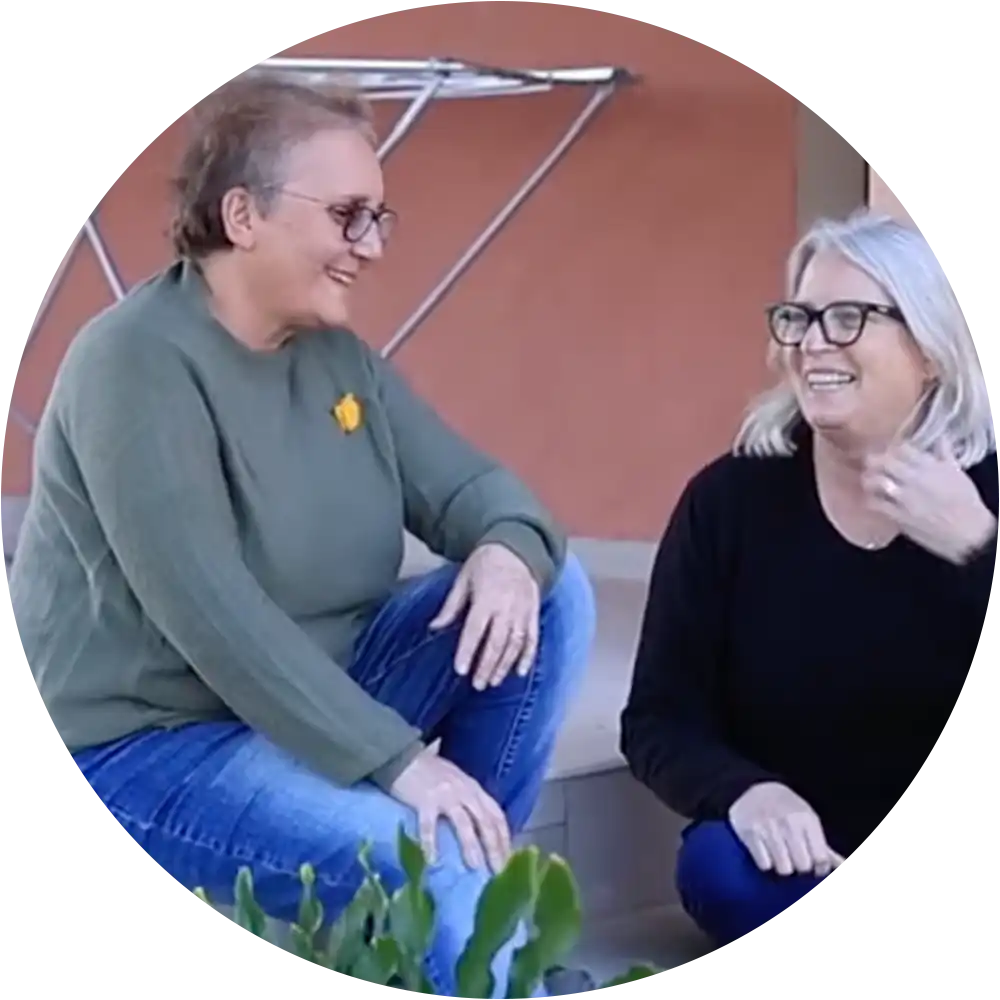 Two older adult volunteers working together in Israel during a year of service.