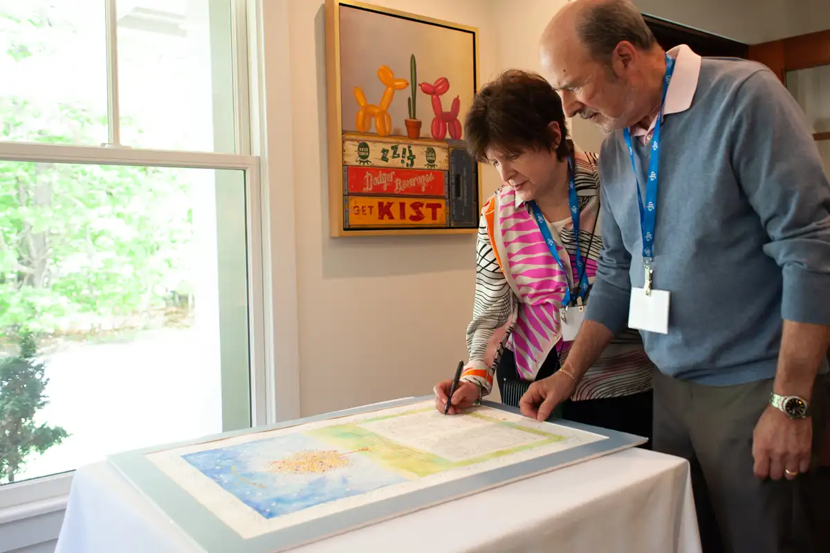 Jewish nonprofit professionals engaging donors at a fundraising event in Boston