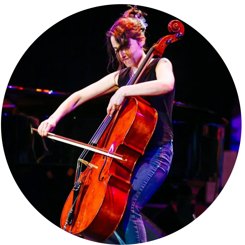 Past arts and culture grantee performs music on stage in Greater Boston